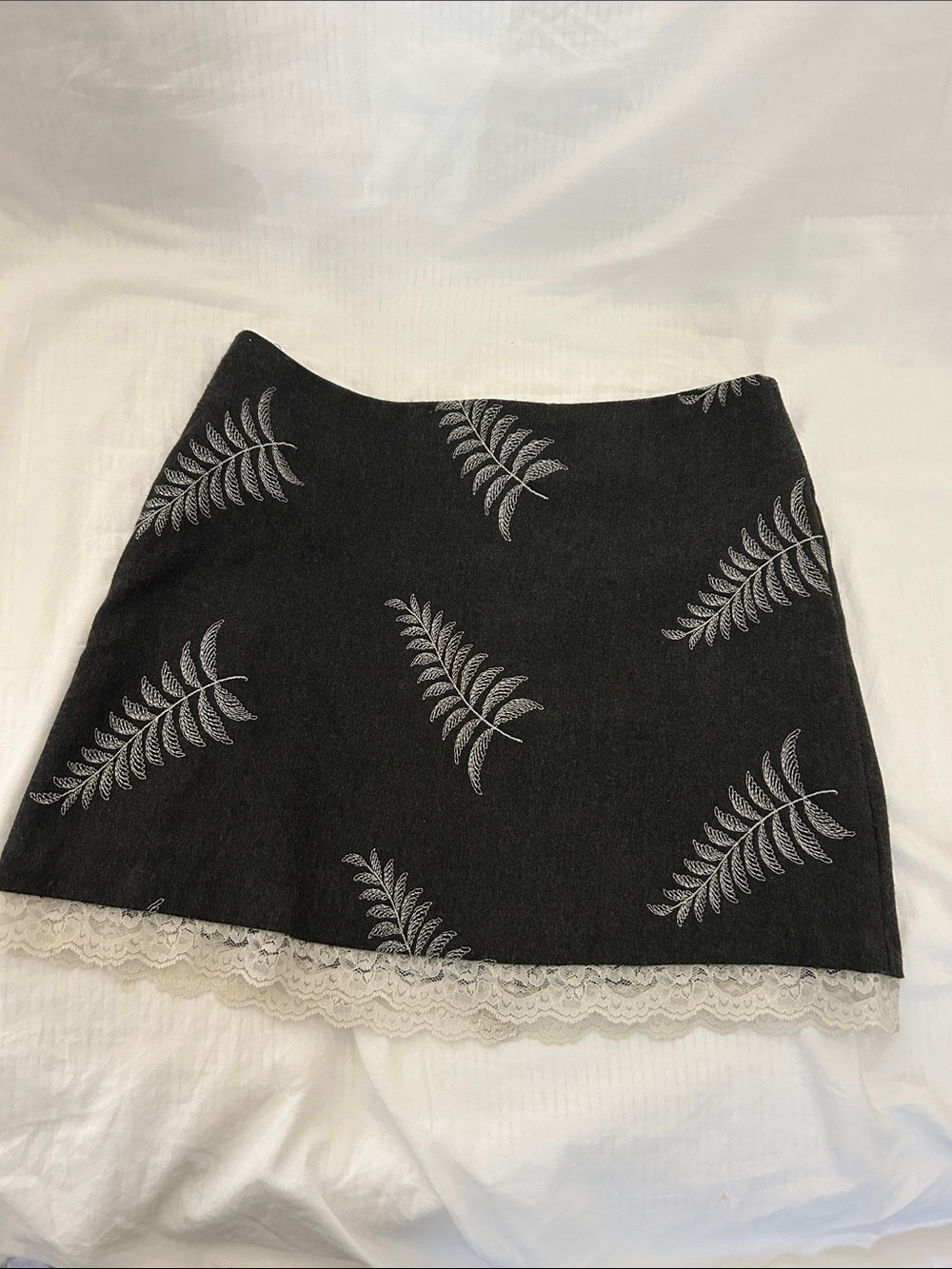 Fern-Print Black Mini Skirt with Cream Lace Hem